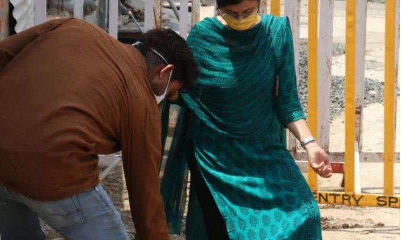 Officer Sanitizing Shoes in Raisen Madhyapradesh