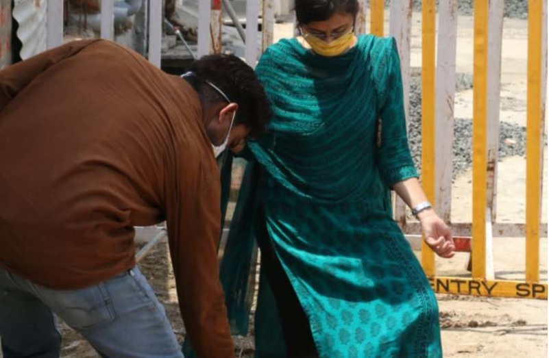 Officer Sanitizing Shoes in Raisen Madhyapradesh